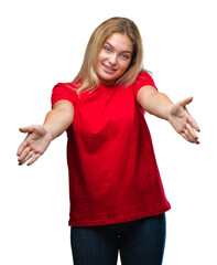 Poster - Young caucasian woman over isolated background looking at the camera smiling with open arms for hug. Cheerful expression embracing happiness.