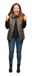 © Krakenimages.com - Beautiful middle age woman wearing winter vest celebrating surprised and amazed for success with arms raised and open eyes. Winner concept.