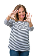 Poster - Beautiful middle age woman wearing stripes sweater over isolated background Smiling doing frame using hands palms and fingers, camera perspective