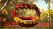 A swing hanging with tree and red and yellow flowers