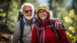 © thodonal - Senior couple hiking in nature with backpacks and smiles