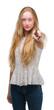 © Krakenimages.com - Blonde teenager woman pointing with finger to the camera and to you, hand sign, positive and confident gesture from the front