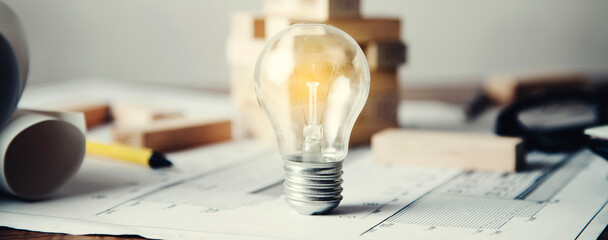 Canvas Print - light bulb with wooden cubes