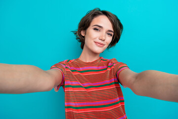 Sticker - Photo of lovely pretty girl shooting filming video broadcast isolated on cyan color background