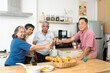 © pixs4u - Group of Happy Asian senior drinking wine to celebrate while dining together