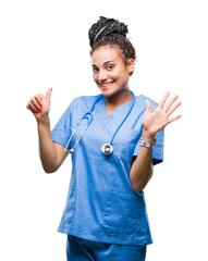 Poster - Young braided hair african american girl professional surgeon over isolated background showing and pointing up with fingers number six while smiling confident and happy.