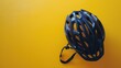 Bicycle helmet on a bright yellow background