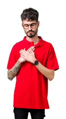 Poster - Young handsome man wearing glasses over isolated background smiling with hands on chest with closed eyes and grateful gesture on face. Health concept.