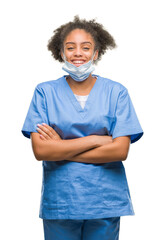 Poster - Young afro american doctor woman over isolated background happy face smiling with crossed arms looking at the camera. Positive person.