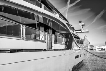 Sticker - Sanremo, Italy - December 30, 2023: Yachts along the port of Sanremo on a beautiful afternoon