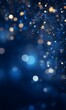 © Mahmud7 - Abstract blue background with bokeh lights and glitter
