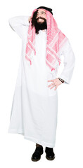 Wall Mural - Arabian business man with long hair wearing traditional keffiyeh scarf Smiling confident touching hair with hand up gesture, posing attractive