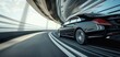 © Divine123victory - Rear view of black Business car on high speed in turn. black car rushing along a high-speed background blur effect