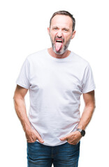 Poster - Middle age hoary senior man wearing white t-shirt over isolated background sticking tongue out happy with funny expression. Emotion concept.