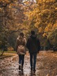 © ckybe - A snapshot of youthful couple strolling in a park during fall season.