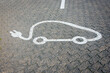 © Rob Wilkinson - Sign for charging electric vehicles painted on the road at a service station