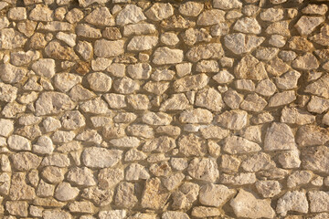 Background of stone wall texture photo. Close-up of stone wall.