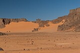Fototapeta Nowy Jork - View of rock formations and Dunes of Ouan Zaoutan, sand dunes in Tadrart Rouge, Tassili n Ajjer National Park. Sahara, Algeria, Africa.