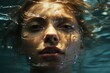 A serene and ethereal human face emerges from the depths of crystal clear water, lost in the tranquil embrace of swimming underwater