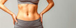 © edojob - fit female body dressed in a grey crop top, highlighting a slim waist, toned abdomen, and healthy skin, set against a neutral background, suitable for health and fitness themes
