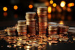 © Silga - Stacks of golden, silver, and copper coins are piled on a reflective surface against a soft bokeh light background, conveying wealth and financial growth. Can be used for business.