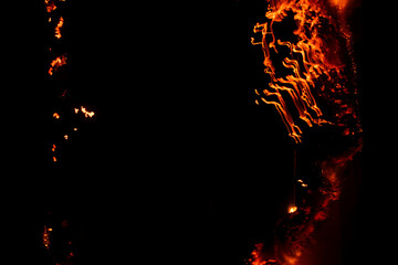 burning paper, glowing edge of paper on a black background