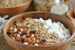 bowl of muesli granola grain cereal berries and chocolate