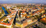 Fototapeta Miasto - Scenic view from drone of Hradec Kralove cityscape overlooking White tower and Cathedral of Holy Spirit on autumn day, Czech Republic..
