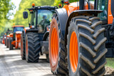 Fototapeta  - Tractors Line Up in Urban Protest Against Agricultural Tax Increases