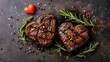Two grilled heart-shaped beef steaks with spices for Valentine's Day