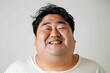 太っている日本人男性のポートレート（デブ・肥満・減量・ぽっちゃり・ダイエット・フィットネス）
