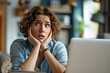 © เลิศลักษณ์ ทิพชัย - Angry freelance woman sitting with computer and macbook at table with confused and troubled expression