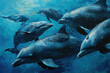 A group of dolphins swimming in the sea
