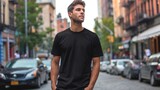 Fototapeta  - Man model shirt mockup. Boy wearing black t-shirt on street in daylight. T-shirt mockup template on hipster adult for design print. Male guy wearing casual t-shirt mockup placement.