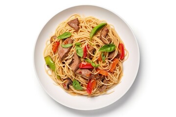 Canvas Print - Top view of a noodle dish with meat and vegetables on a white background