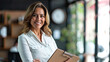 Middle age hispanic woman smiling confident holding clipboard at office