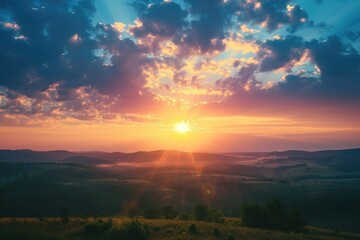  Stylized photo of a sunrise seen from a high vantage point over a rolling countryside