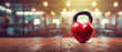 Kettlebell in the shape of a heart on wooden table against gym background banner for Valentine's Day, birthday, anniversary, wedding, Healthy fitness, gym workout concept, copy space