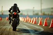 Motorcycle training with cones at motordrome