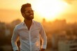 Indian high class man, standing and smiling looking in side during golden hour 