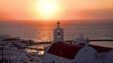 Beautiful View Of Mykonos Island With The Port And Town During A Summer Sunset, Cyclades, Greece