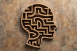 © Dennis - A labyrinth in the silhouette of a human head depicting the concept of confusion, complicated thinking, pondering, mental health concept