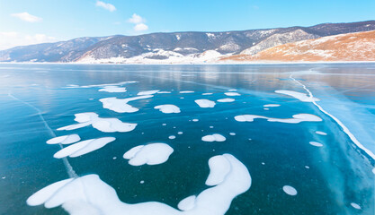 Wall Mural - Beautiful clear ice with cracks on the Lake Baikal -  Clean, cool ice and cleanest lake in the world - Siberia, Russia