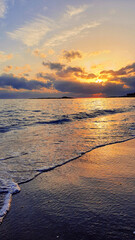 Wall Mural - Colorful sunset over the sea waves.Sunset sky over sea.