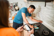© Odua Images - asian man install grill stove after maintenance in the kitchen