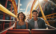 © Mark&Toby Image Co. - Happy Young couple on a roller coaster