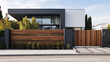 © benjawan - front facade shot of large contemporary
