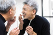 歯磨きをする50代日本人男性