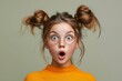 © Violetta - Photo of astonished little girl with funny ponytails floating in the air, she is surprised, her mouth open, banner with empty space, discount, sale, isolated monochrome background