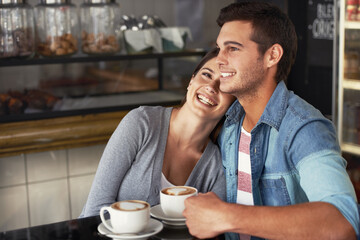 Canvas Print - Love, happy couple and drinking coffee in shop, cafe and bonding together on valentines day date. Smile, man and woman in restaurant with latte for connection, commitment and support in relationship